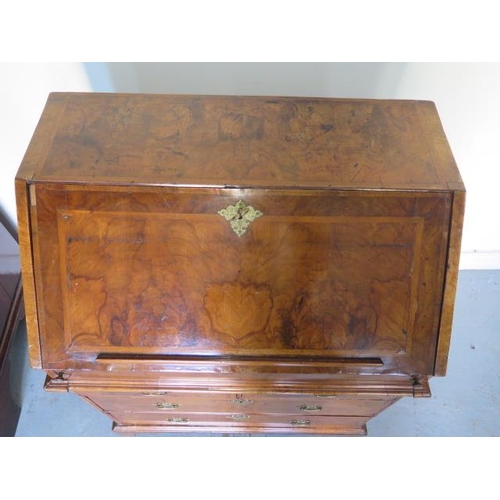 526 - An early 18th century walnut George l bureau with a fitted interior of small drawers and pigeon hole... 