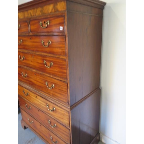 529 - A Georgian mahogany chest on chest with two short over six long graduating drawers on bracket feet -... 