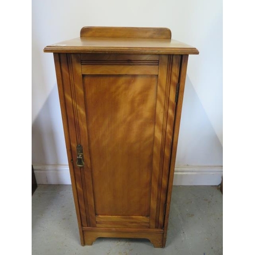 547 - A walnut bedside cupboard - Height 81cm x 37cm x 36cm - in polished condition