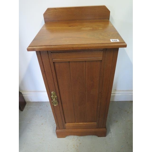 548 - A walnut bedside cupboard - Height 80cm x 37cm x 35cm - in polished condition