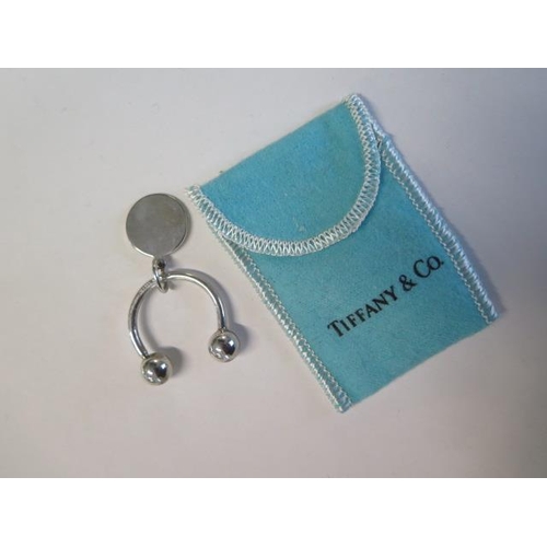 68 - A Tiffany 925 silver key ring - 3cm wide with a pouch - retail price £190