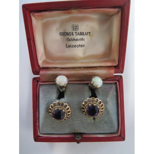 71 - A pair of 9ct yellow gold amethyst earrings 14mm wide, approx total weight 4.8 grams, generally good... 