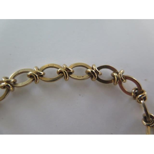 72 - A 9ct hallmarked yellow gold bracelet - Length 18cm, approx weight 10 grams, catch good