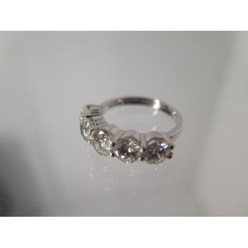 69 - A five stone diamond ring - approx 2.75ct of diamonds set in platinum - ring size M - head size appr... 