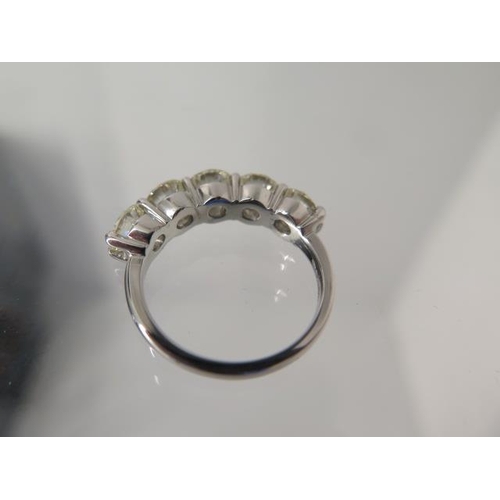 69 - A five stone diamond ring - approx 2.75ct of diamonds set in platinum - ring size M - head size appr... 