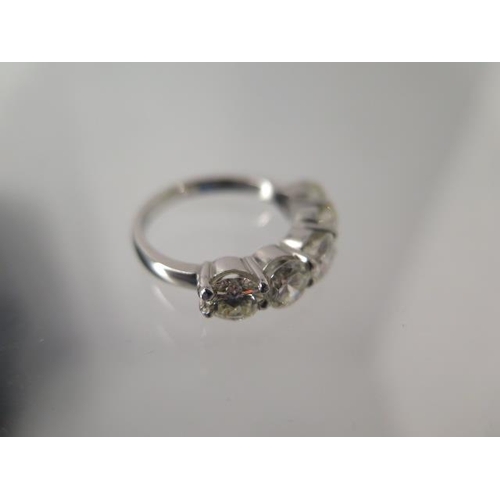 69 - A five stone diamond ring - approx 2.75ct of diamonds set in platinum - ring size M - head size appr... 