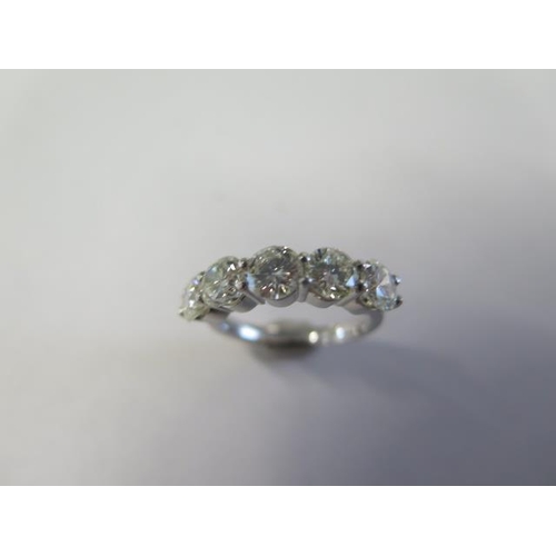 69 - A five stone diamond ring - approx 2.75ct of diamonds set in platinum - ring size M - head size appr... 