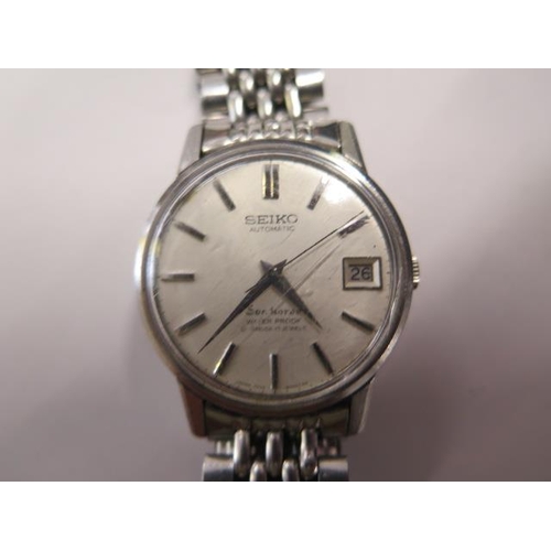 A Seiko automatic stainless steel sea horse date wristwatch - 34mm case -  running, hands and date ad