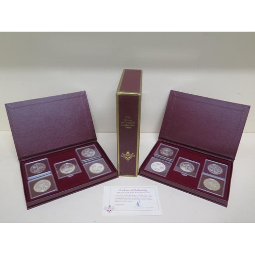 217 - A double album set of 10 1980 silver .500 proof Cayman Islands Kings Collection 25 dollar coins - ea... 