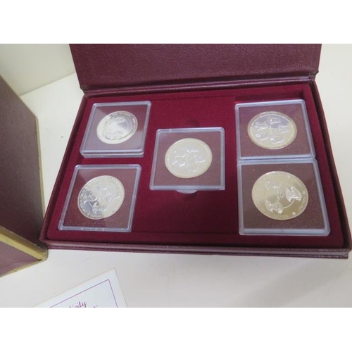 217 - A double album set of 10 1980 silver .500 proof Cayman Islands Kings Collection 25 dollar coins - ea... 