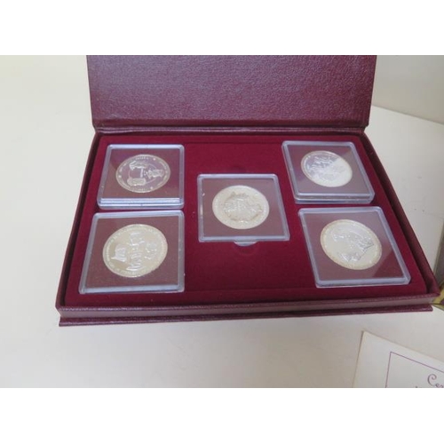 217 - A double album set of 10 1980 silver .500 proof Cayman Islands Kings Collection 25 dollar coins - ea... 