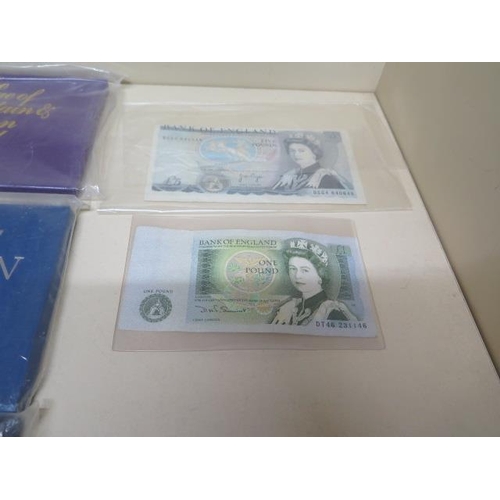 219 - A collection of 13 proof coin sets from 1972 to 1984, a £5 and £1 note