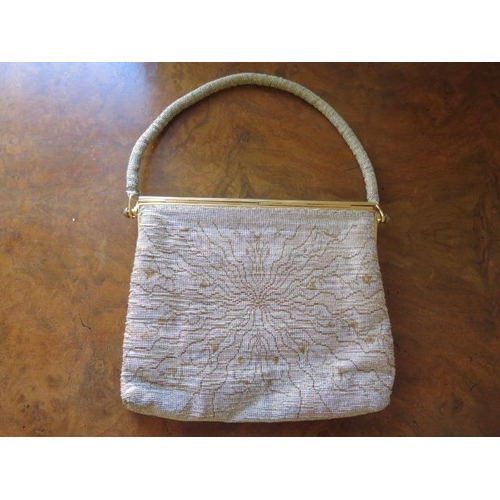 228 - A vintage Asprey silver and gilt material evening handbag, made in France - Width 20cm - some wear b... 