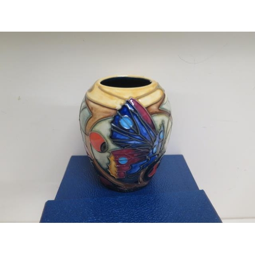 230 - A small Moorcroft 2002 butterfly vase - Height 9cm boxed with three Moorcroft Collectors Club newsle... 