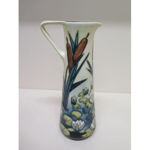 233C - A Moorcroft Lily and Bullrush single handle jug vase C05 - Height 24cm - good condition