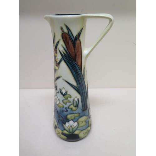 233C - A Moorcroft Lily and Bullrush single handle jug vase C05 - Height 24cm - good condition