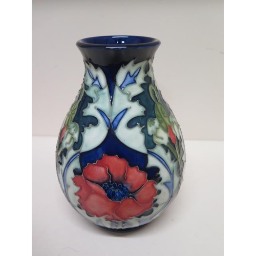 233E - A Moorcroft C96 vase - Height 19cm - in good condition