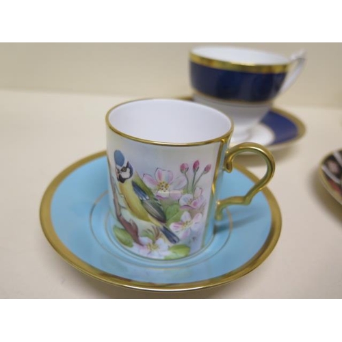 239 - A Crown Derby Imari 1128 cup and saucer, a Caverswall blue tit cup and saucer, a Dresdan cup and sau... 