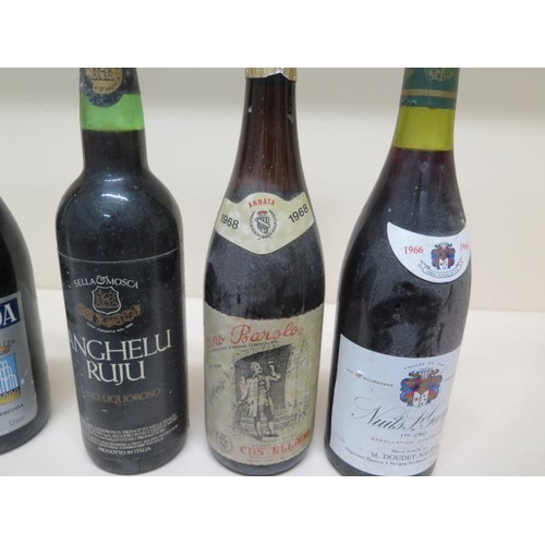 243A - Four bottles of red wine - 1982 Barolo, 1966 Nuits St Georges 1er Cru, 1993 Gevrey Chambertin 1er Cr... 