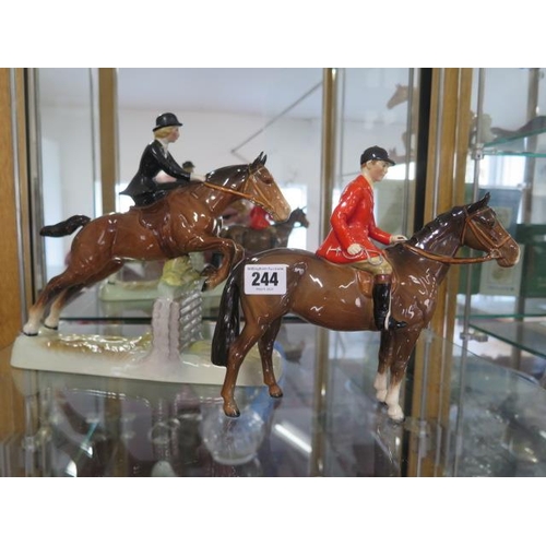 244 - A Beswick model of a lady side saddle on jumping horse 982- rings as if cracked - and a Beswick Hunt... 