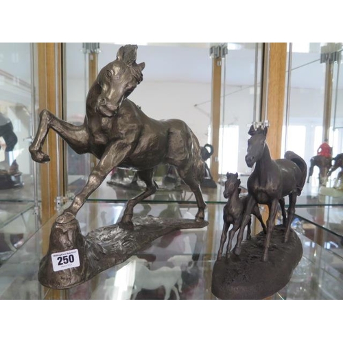 250 - A Paul Jenkins resin Arab horse - Height 32cm and a Takes base Mare and Foal resin group