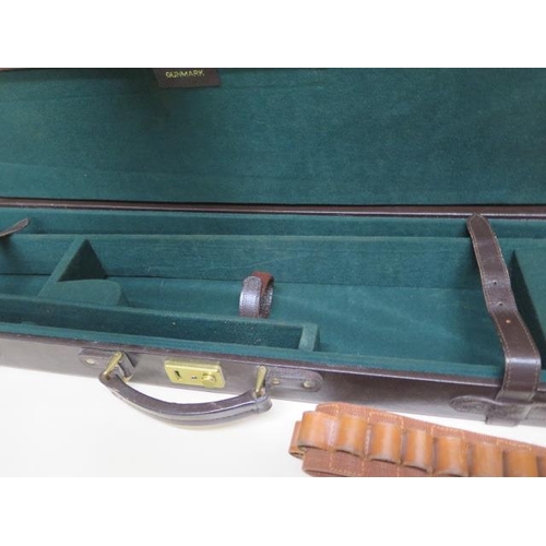 253 - A Gunmark leather shotgun case, a Brady cartridge bag and a cartridge belt