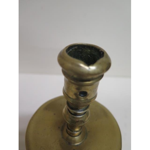 266 - An 18th century brass candlestick with drip tray - Height 20cm