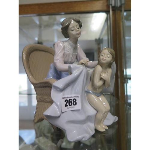 268 - A Lladro group mother and child - Height 20cm - in good condition