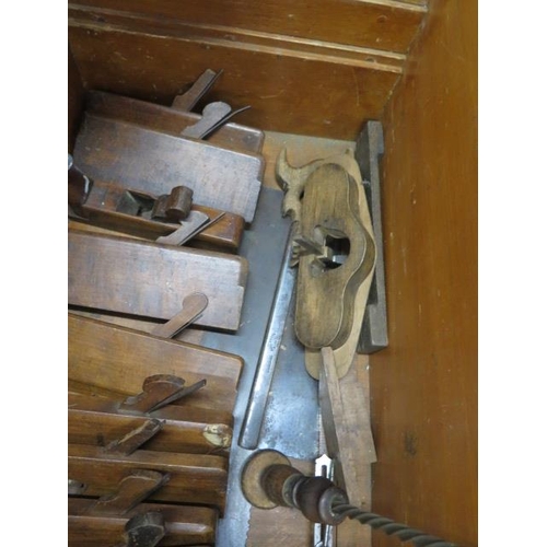 270 - A 19th century pine carpenters tool chest with moulding and other planes, chisels, saws as per photo... 