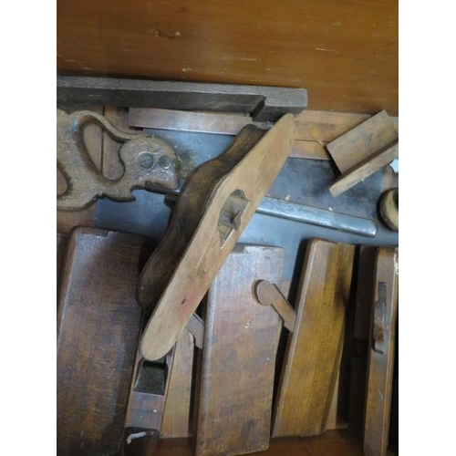 270 - A 19th century pine carpenters tool chest with moulding and other planes, chisels, saws as per photo... 