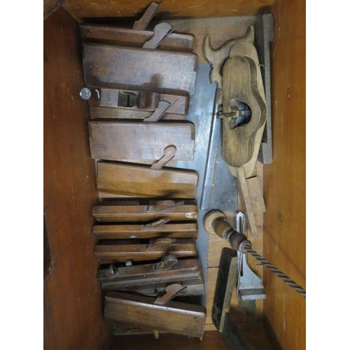 270 - A 19th century pine carpenters tool chest with moulding and other planes, chisels, saws as per photo... 