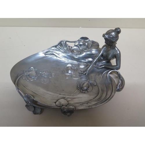 273 - An Art Nouveau polished pewter water lily card tray circa 1900 stamped with an angel symbol and the ... 