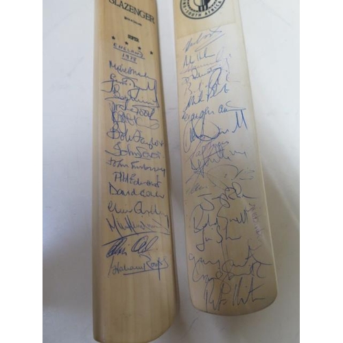 274 - Two autographed mini cricket bats signed by England, New Zealand and South Africa teams, the first s... 