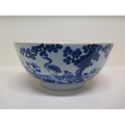 279 - A 19th century Chinese blue and white bowl - Height 11.5cm x Width 26cm - in good condition, minor c... 