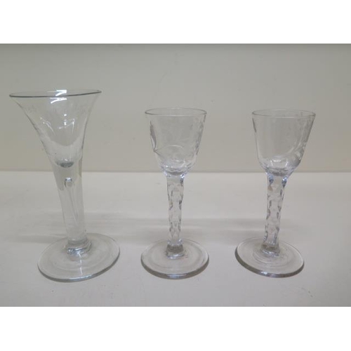 287 - A pair of etched 18th/19th century cordial glasses - Height 14.5cm and another with teardrop air ste... 