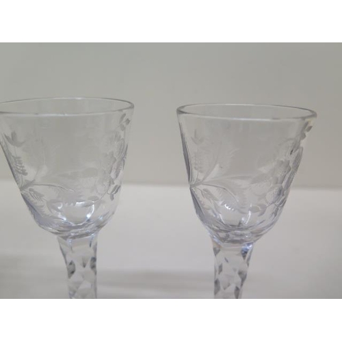 287 - A pair of etched 18th/19th century cordial glasses - Height 14.5cm and another with teardrop air ste... 