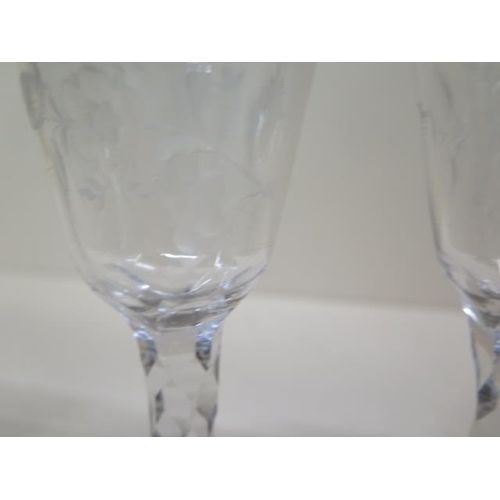 287 - A pair of etched 18th/19th century cordial glasses - Height 14.5cm and another with teardrop air ste... 