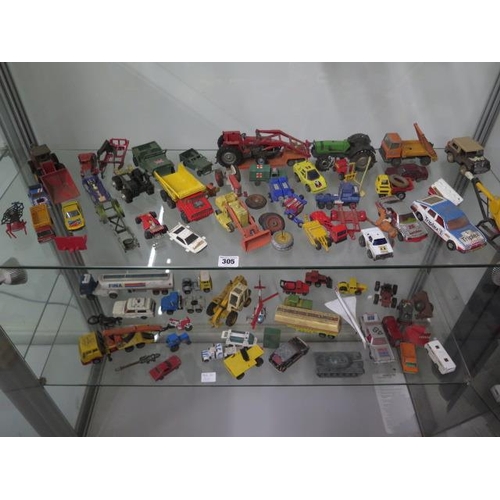 305 - A collection of approx 70 diecast and plastic vehicles