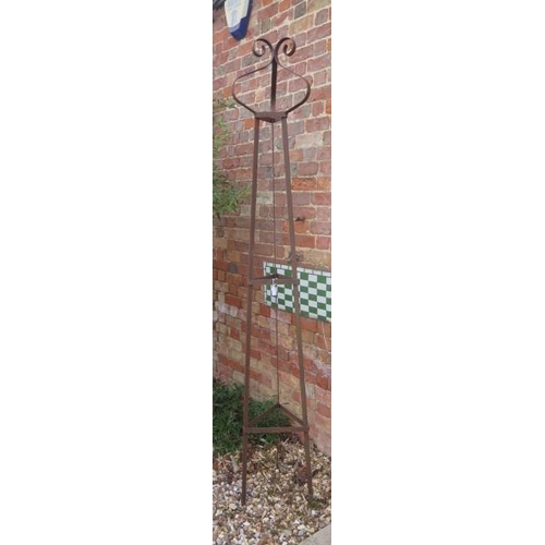 487 - A hand forged wrought iron triangular section garden obelisk with scroll finial - Height 231cm x Wid... 