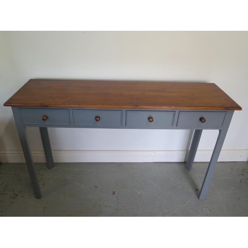 505 - A painted four drawer hall/side table with a polished distressed pine top - made by a local craftsma... 