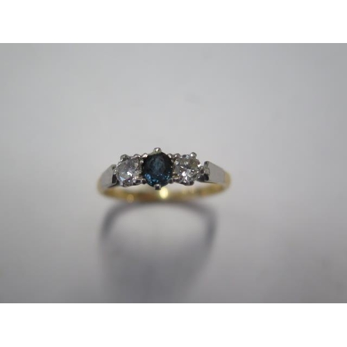 52 - An 18ct yellow gold diamond and sapphire three stone ring size R - approx weight 3.5 grams - good co... 