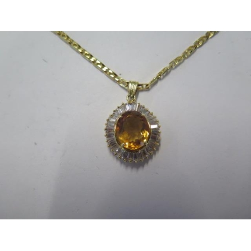 56 - A 585 14ct yellow gold Citrine pendant on a 14ct 50cm chain - total weight approx 14 grams