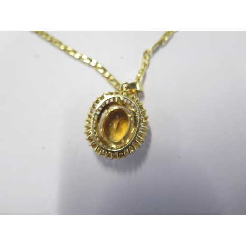 56 - A 585 14ct yellow gold Citrine pendant on a 14ct 50cm chain - total weight approx 14 grams