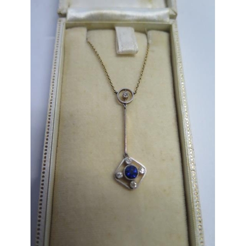 57 - A 9ct yellow gold necklace set with a sapphire and small diamonds - approx weight 3.7 grams - repair... 