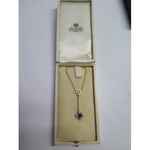 57 - A 9ct yellow gold necklace set with a sapphire and small diamonds - approx weight 3.7 grams - repair... 