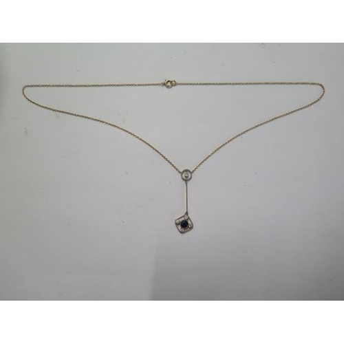 57 - A 9ct yellow gold necklace set with a sapphire and small diamonds - approx weight 3.7 grams - repair... 