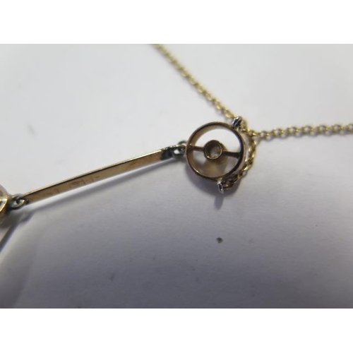 57 - A 9ct yellow gold necklace set with a sapphire and small diamonds - approx weight 3.7 grams - repair... 