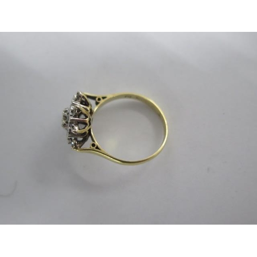 60 - A hallmarked 18ct yellow gold diamond cluster ring size N - approx weight 4.5 grams - diamonds brigh... 