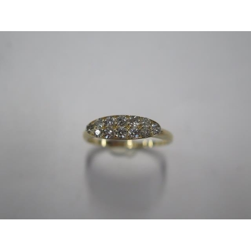 61 - An Edwardian 18ct yellow gold Navette shape 12 stone diamond ring, ring size O/P, head size 15mm x 5... 