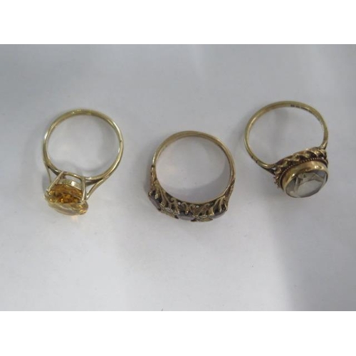 62 - Three 9ct yellow gold rings sizes L/M - total weight approx 9.5 grams